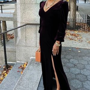 Velvet gown with puff shoulders in plum